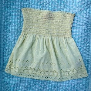 Pale yellow smocked eyelet top